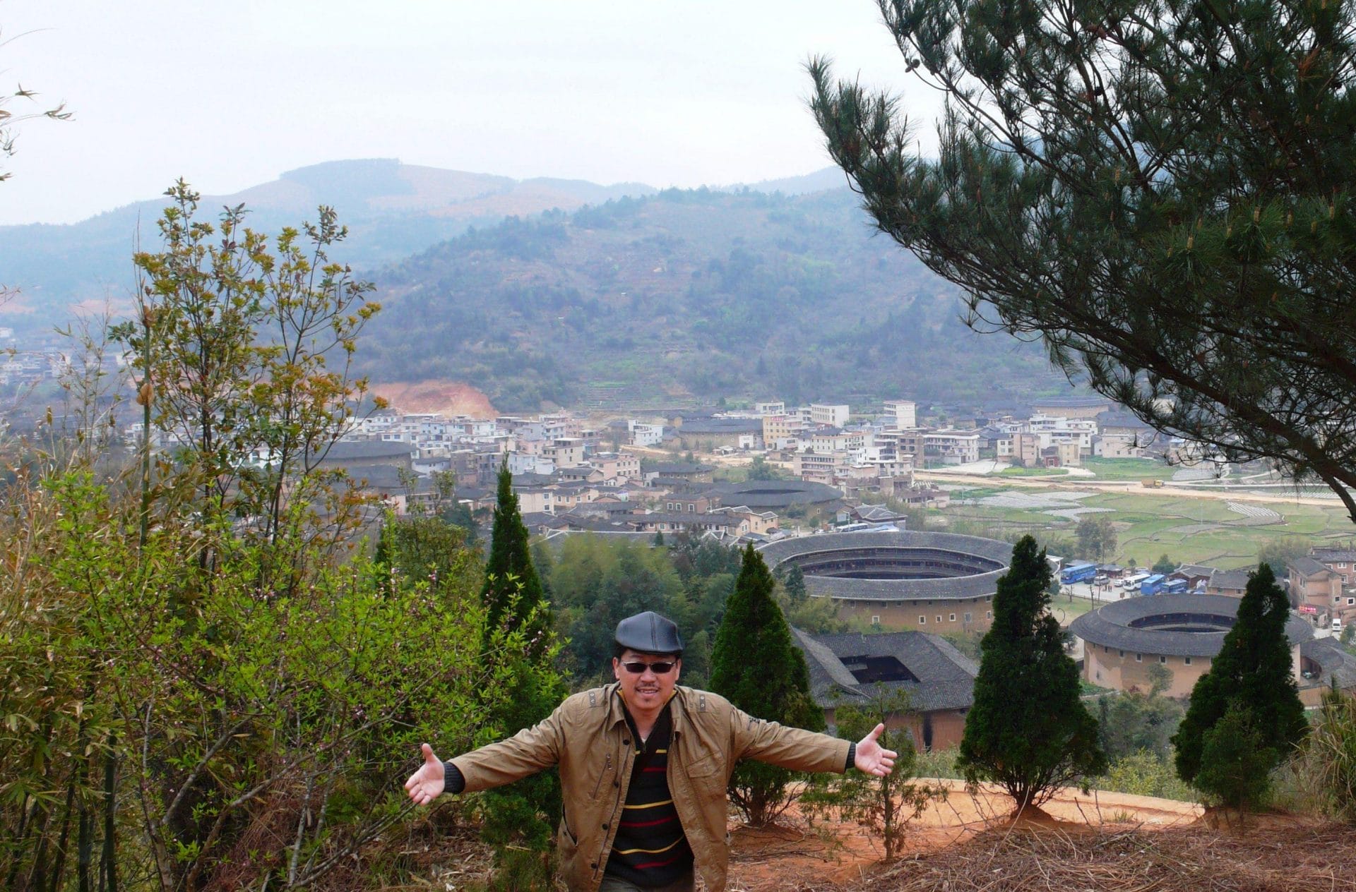 Master Soon at Fujian Tulou.Fujian Tulou is a property of 46 buildings constructed between the 15th and 20th centuries over 120 km in south-west of Fujian province, inland from the Taiwan Strait. 